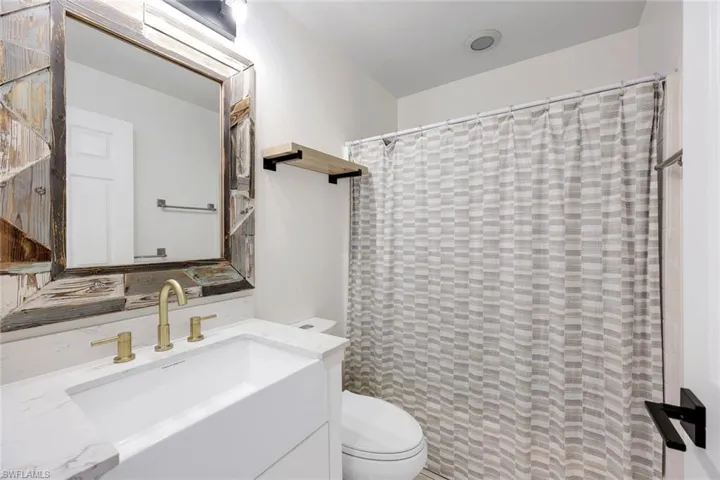 Second bathroom features upgraded vanity.