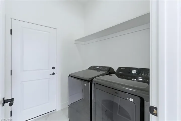 Laundry room featuring washer and dryer