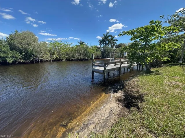 Dock featuring a water view