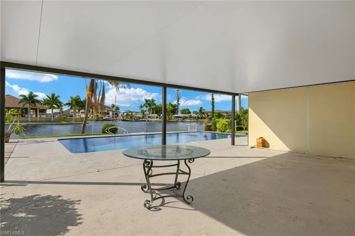 View of pool featuring a water view