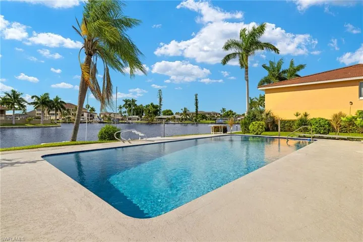 View of pool featuring a water view