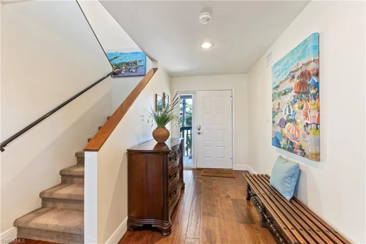 Entrance foyer featuring wood flooring