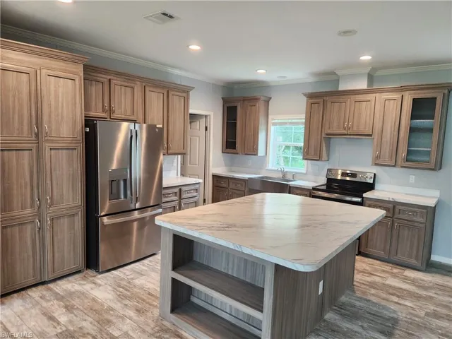 With island and walk in pantry