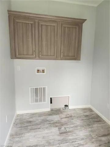 Laundry room with access to master bathroom