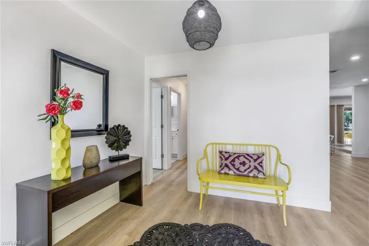 Sitting room with light wood-type flooring