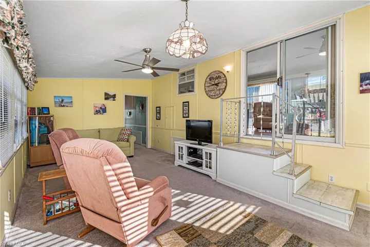 Surrounding community featuring shuffleboard and a residential view