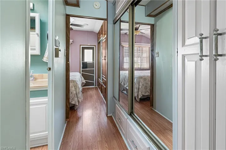 Bedroom with washing machine and dryer