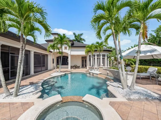 Pool facing back at house