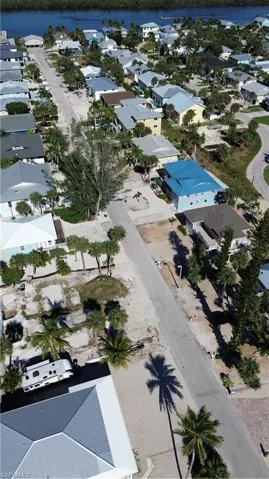 Aerial shot from beach to bay down Anchorage Street