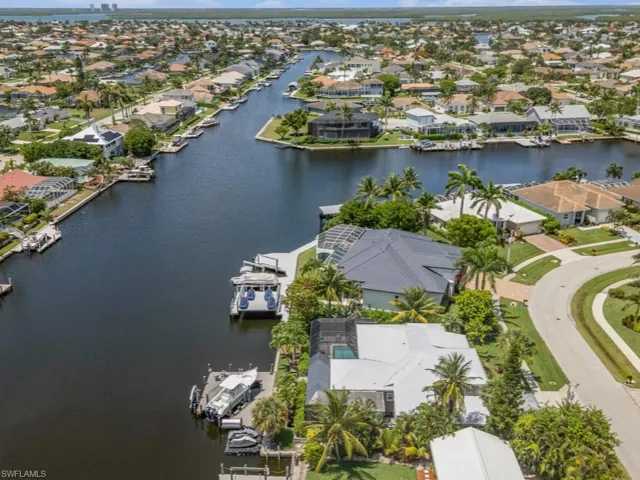 Aerial view of residential area with a large body of water