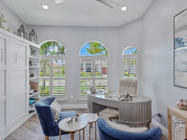 Office area featuring light wood finished floors and baseboards