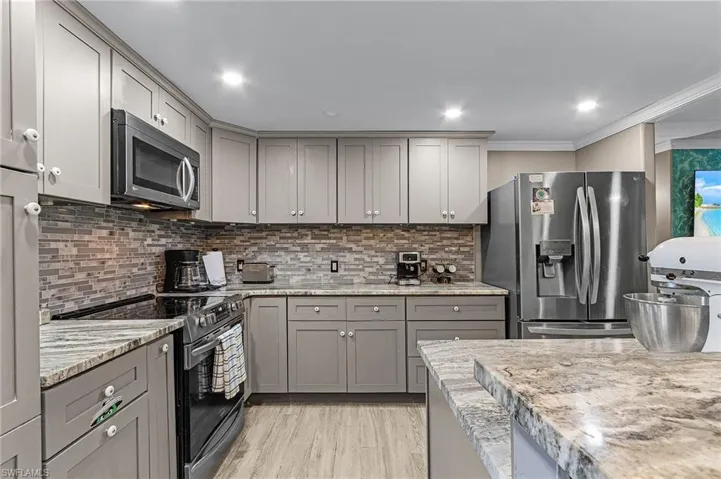 Lots of counter and cabinets in the updated kitchen.