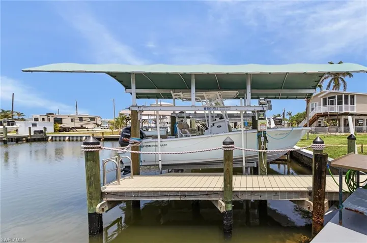 New pilings, composite dock, covered lift, all new and completed in 2023.