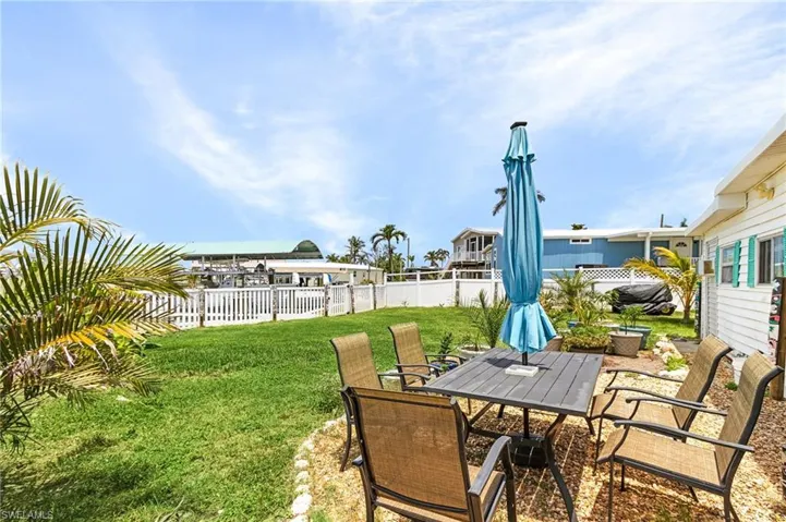 Large fenced-in backyard.  Plenty of room for a pool!