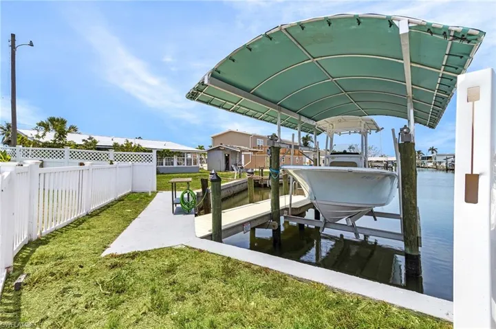New composite dock, covered lift, and mere minutes to the ICW and the Gulf of Mexico!