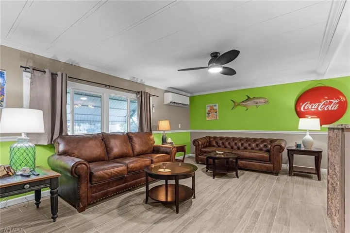 Living Room.  Sofa under the window does convey.
