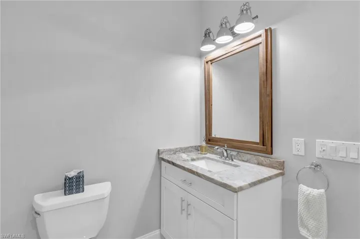 Multi Gen Living Suite Bathroom featuring toilet and vanity