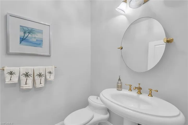 Poweder Bathroom Just off Foyer and Office
