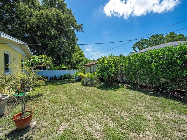 View of yard with a shed