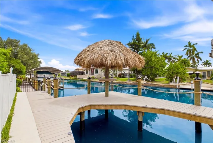 Relax under the authentic tiki hut while enjoying 80 feet of waterfrontage and direct Gulf access with no bridges to open water