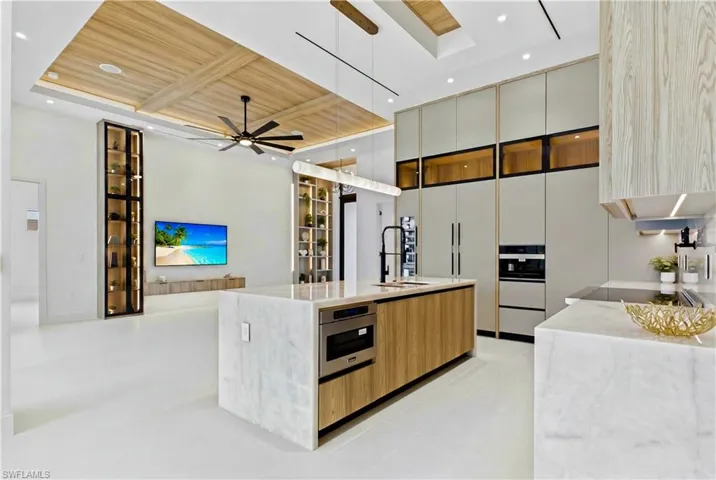 CRISTALLO QUARTZITE COUNTERTOPS, full-height backsplash, POT FILLER & large sink w/ spring single handle faucet add on