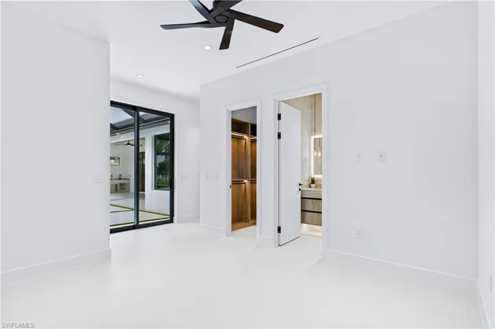 Second Primary Suite - SPLIT FLOOR PLAN w/ 2nd PRIMARY SUITE, 2 GUEST BEDROOMS & HALLWAY BATHROOM ensure PRIVACY & convenience for FAMILY & GUESTS!