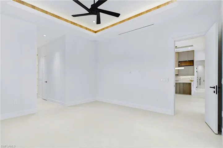 All bedrooms feature ELEGANT TRAY CEILINGS w/ WOOD INLAY ACCENTS