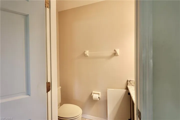 Bathroom featuring toilet and vanity
