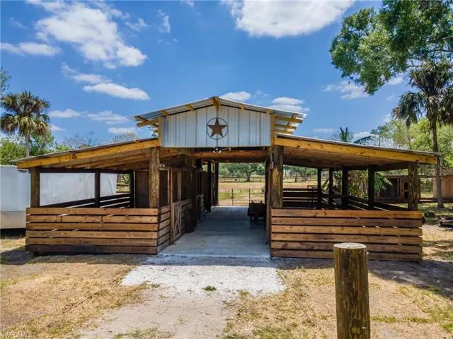 View of community with an exterior structure and an outbuilding