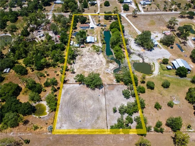 Aerial overview of property's location featuring property boundaries highlighted