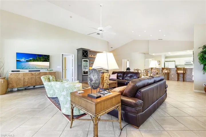 Photo of the open living area from the lanai, showcasing its welcoming and airy design.