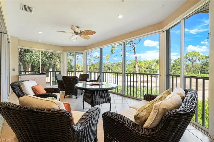 Enclosed lanai offering year-round enjoyment and stunning views of the golf course.