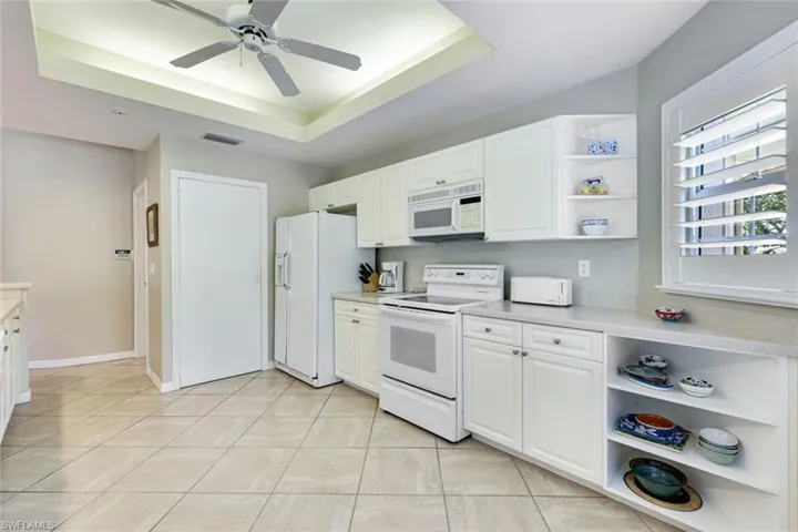 This well-equipped kitchen offers generous storage and enough room for several chefs to create a meal together.