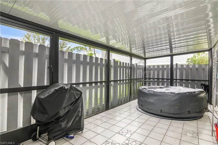 Screened-In & Fenced Tiled Lanai