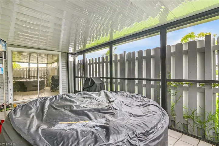 Screened-In & Fenced Tiled Lanai