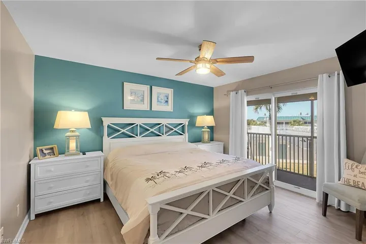 Primary Bedroom with access to private balcony.