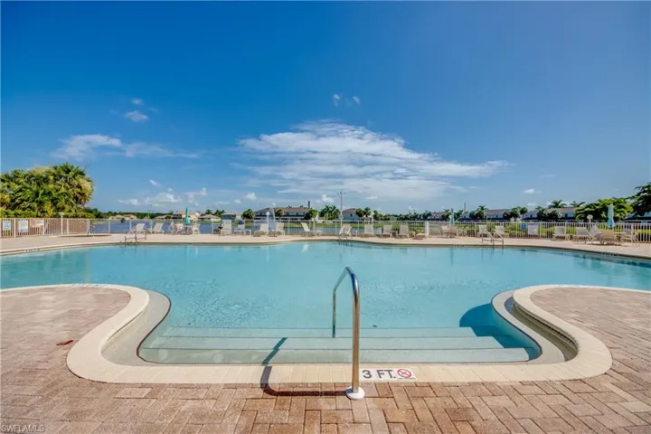 View of pool overlooking lake