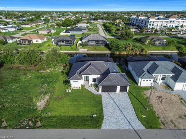 Aerial view of property and surrounding area