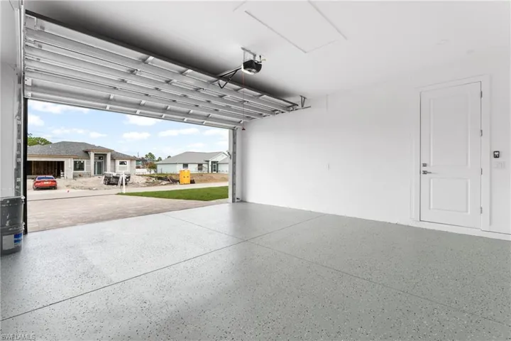 Garage featuring a residential view