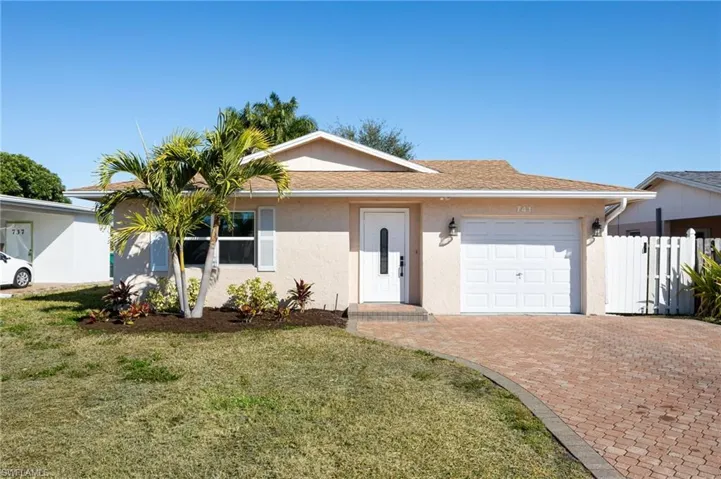 Ranch-style home with stucco siding, one car garage and decorative brick paver driveway.  Newly planted front landscaping. Irrigation system to keep your lawn thriving year-round.