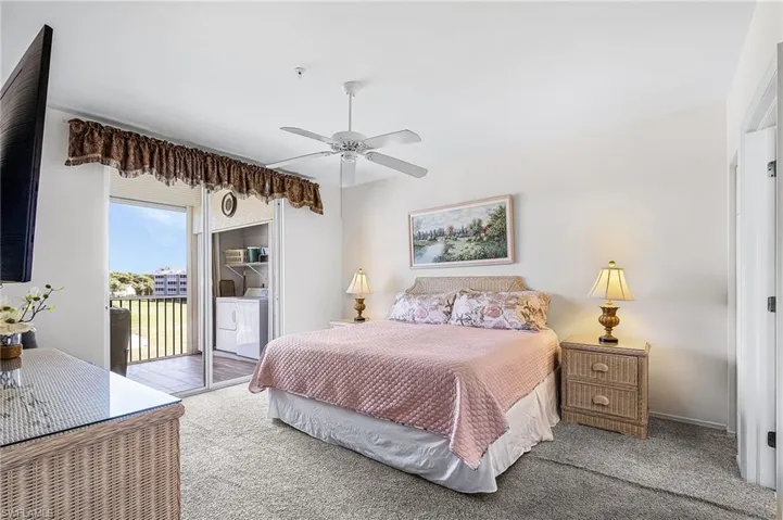 Master bedroom has large sliding doors out to the lanai with quick access to the laundry area.