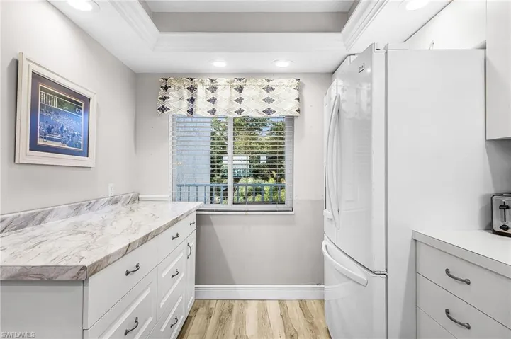 Extra bank of lower cabinets adds a TON of storage and counter top space, too.