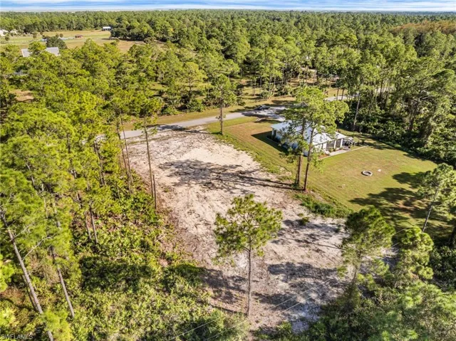 Drone / aerial view of a heavily wooded area
