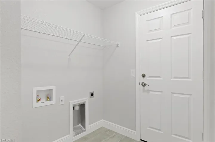 Laundry room featuring hookup for an electric dryer and washer hookup