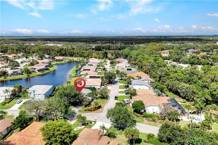 Bird's eye view featuring a water view and a residential view