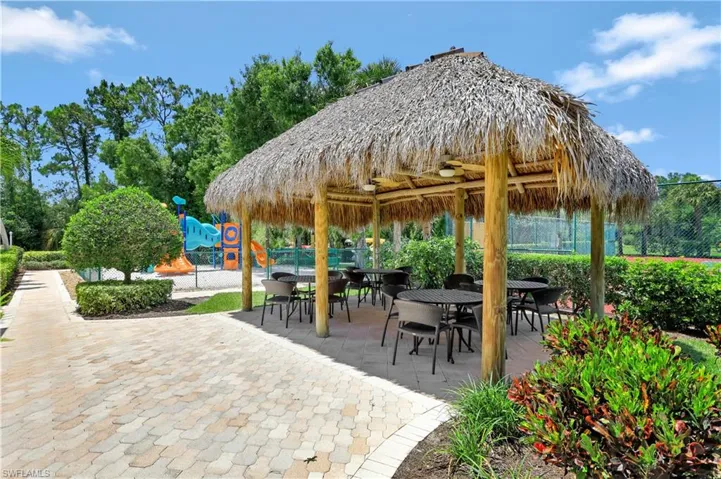 Surrounding community featuring fence, a gazebo, a patio, and outdoor dining area