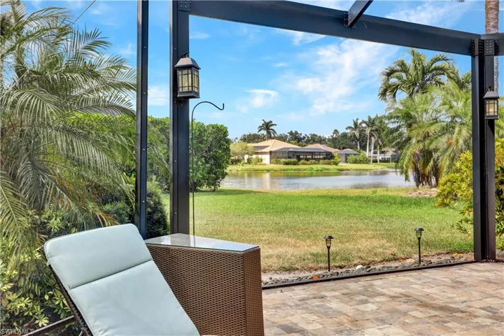 View of patio with a water view