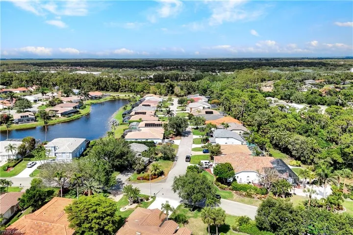 Bird's eye view featuring a water view and a residential view