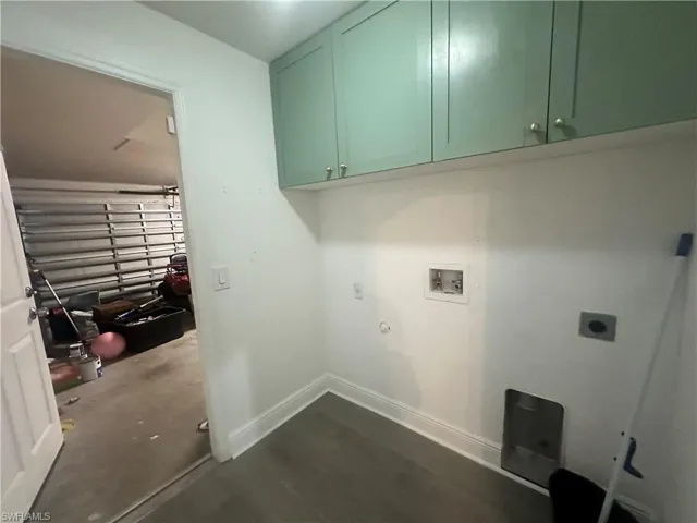 Laundry area featuring hookup for a washing machine, cabinet space, hookup for a gas dryer, and hookup for an electric dryer
