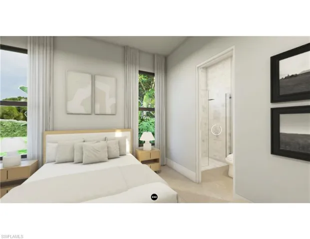 Bedroom with ensuite bath and light tile patterned floors